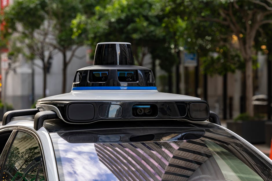 Detailed view of sensors atop an autonomous car, showcasing advanced technology in an urban setting